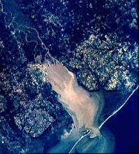 Sediment plume flowing out of Mobile Bay after a major rain event